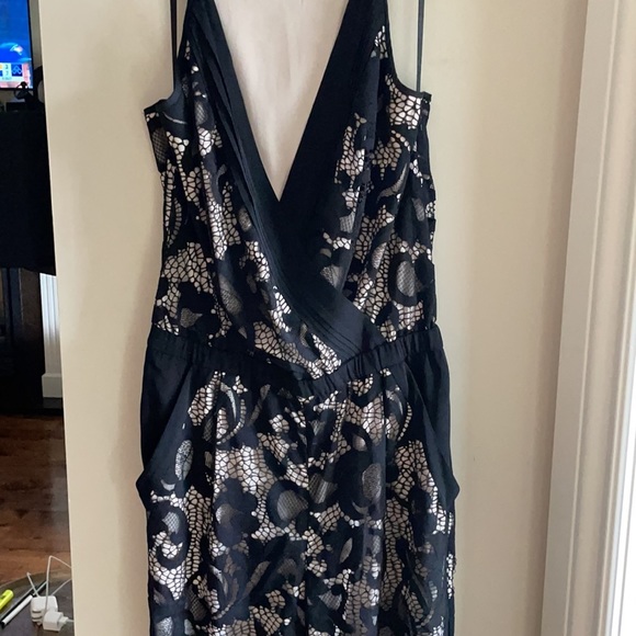 DVF SHANY BLACK LACE JUMPSUIT 6. Bought on Poshmark but it sadly does not fit. - Picture 7 of 12